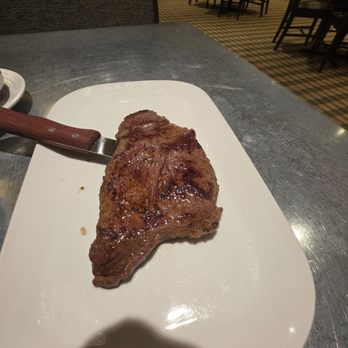 The Kitchen Table - NY steak.  Decent size for $12. Would be nice if it was a bit hotter and seasoned at all. - Breakfast & Brunch Near Me - Las Vegas, Nevada