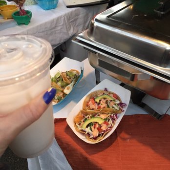 El Veganito - Horchata and sample food trays in the background - Vegan Near Me - La Mesa, California El Veganito - Horchata and sample food trays in the background - Vegan Near Me - La Mesa, California