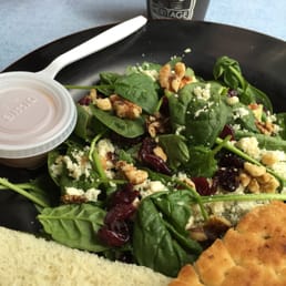 Spinach salad with feta, dried cranberries and walnuts. Spinach salad with feta, dried cranberries and walnuts.