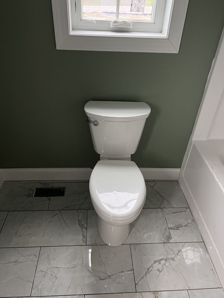 Slide of Go With The Flow Plumbing