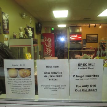 Lia's Pizza - a sign in the window of a restaurant - Pizza Near Me - Grand Rapids, Michigan Lia's Pizza - a sign in the window of a restaurant - Pizza Near Me - Grand Rapids, Michigan