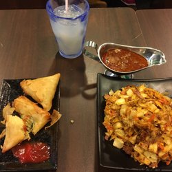 Serendib - Veg samosas, beef Kottu with Lamb Curry and Soursop Juice.
