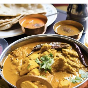 Curry Me Up - a plate of food and a bowl of rice - Food Trucks Near Me - Tracy, California Curry Me Up - a plate of food and a bowl of rice - Food Trucks Near Me - Tracy, California