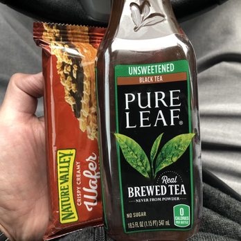 Chevron - a person holding a bottle of pure leaf - Gas Stations Near Me - La Cañada Flintridge, California Chevron - a person holding a bottle of pure leaf - Gas Stations Near Me - La Cañada Flintridge, California
