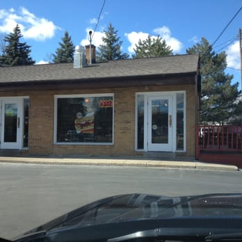 Subway - a car parked in front of a building - Sandwiches Near Me - Tecumseh, Michigan