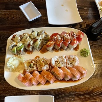 Wasabi Sushi - Top Left: Godzilla Roll Top Right: Red Moon Roll on the bottom is a veggie tempura wrapped in soy paper. All delicious!! - Japanese Near Me - Draper, Utah Wasabi Sushi - Top Left: Godzilla Roll Top Right: Red Moon Roll on the bottom is a veggie tempura wrapped in soy paper. All delicious!! - Japanese Near Me - Draper, Utah