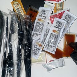 All Stars Sports Lounge & Grill - Sauces + plasticware & napkins