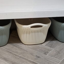 Perfect Closet & Cabinets - MISSING wood dividers that the separate baskets. HE didn't want to purchase additional wood to complete the original project design.