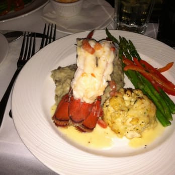 Rusty Scupper - Crab cake and lobster tail at the New Years Eve Extravaganza. - Seafood Near Me - Baltimore, Maryland Rusty Scupper - Crab cake and lobster tail at the New Years Eve Extravaganza. - Seafood Near Me - Baltimore, Maryland