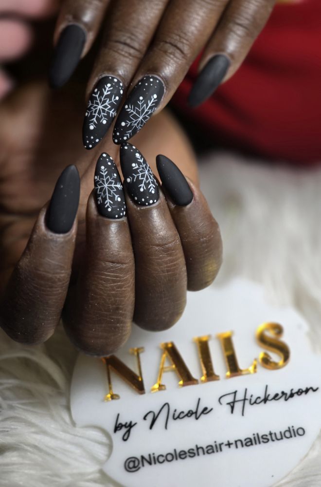 Nicole's Hair + Nail Studio Logo