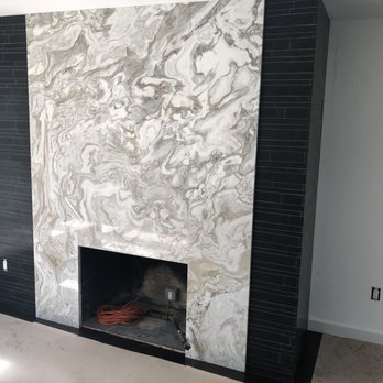 Kitchen Traditions - a fireplace in a living room - Cabinetry Near Me - Danbury, Connecticut Kitchen Traditions - a fireplace in a living room - Cabinetry Near Me - Danbury, Connecticut
