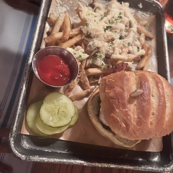 Iron Works - Wood-Grilled Burger with a fried egg and garlic Parmesan Truffle Fries - American Near Me - Warwick, Rhode Island Iron Works - Wood-Grilled Burger with a fried egg and garlic Parmesan Truffle Fries - American Near Me - Warwick, Rhode Island
