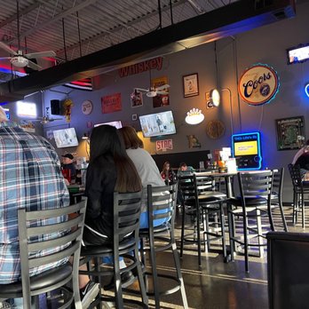 The Irish Gypsy - people sitting at the bar - Irish Pub Near Me - O'Fallon, Missouri The Irish Gypsy - people sitting at the bar - Irish Pub Near Me - O'Fallon, Missouri