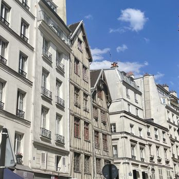Secret Food Tours - Oldest Home in Paris (darker shaded home) - Food Tours Near Me Secret Food Tours - Oldest Home in Paris (darker shaded home) - Food Tours Near Me