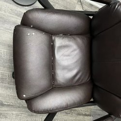 Office Depot - Close-up of chair after 2 years. Horrible. Peeling all over. Cheapest material, obviously