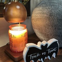 Nona Jo's - Candle warmer, candle, and a trick or treat sign that was free. I love this store
