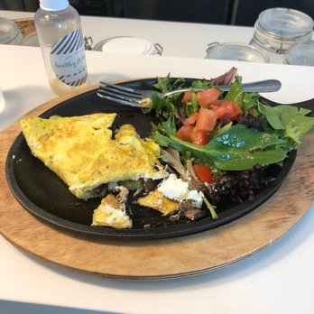 Healthy & Happy Cafe - Hemingway omelette mushrooms and goat cheese - Juice Bars & Smoothies Near Me - Miami, Florida Healthy & Happy Cafe - Hemingway omelette mushrooms and goat cheese - Juice Bars & Smoothies Near Me - Miami, Florida