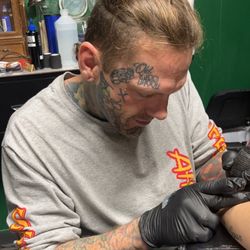 Irish Custom Tattoos and Piercings - The owner/artist of All In Tattoo and Piercing