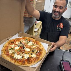 Bono's Pizza & Subs - Bono's margarita pizza