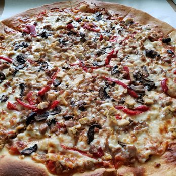 Gelson's Rancho Mirage - 18" 4 topping pizza baked fresh was $17 @ the Wolfgang puck eatery inside the market.   About a 20 minute wait to assemble and bake. - Grocery Near Me - Rancho Mirage, California