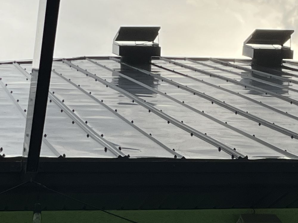 Slide of Andrews Roofing