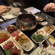 Photo of The Melting Pot - Sacramento, CA, United States. The Classic* and Coq au Vin*