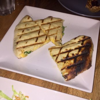Ghee Indian Kitchen - Spicy, cheesed filled naan - Indian Near Me - Miami, Florida Ghee Indian Kitchen - Spicy, cheesed filled naan - Indian Near Me - Miami, Florida