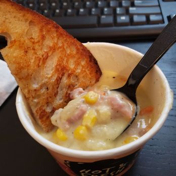 Twice Bak'd Bistro - a bowl of soup and a piece of bread - Bakeries Near Me - Durant, Oklahoma