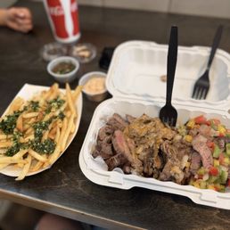 Gaucho Sampler comes with a side of fries, and I put the chimichurri on the side Gaucho Sampler comes with a side of fries, and I put the chimichurri on the side