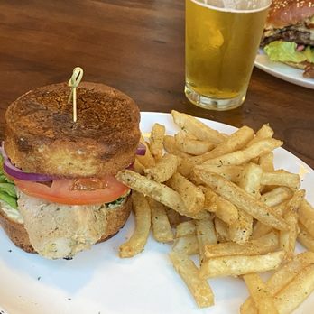 Bushfire Kitchen - Riverside - Chicken sandwich on gluten free bread with a side of fries - American Near Me - Riverside, California