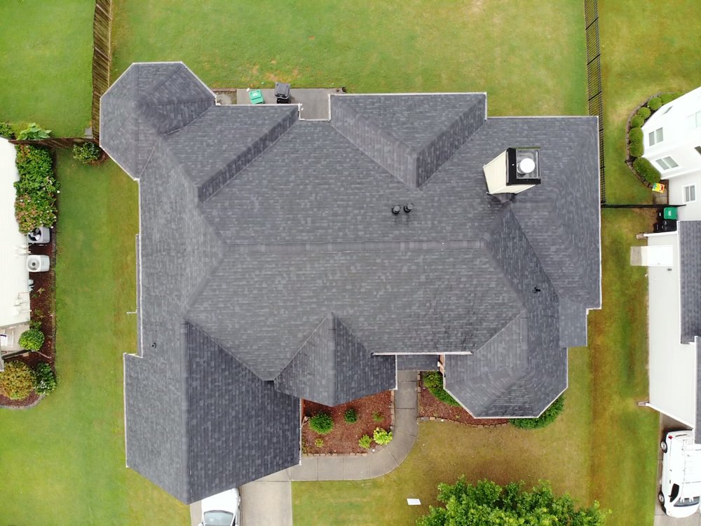 Slide of ER Roofing Specialist