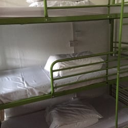 Venture Hostel - Bunk beds 3 high, each with a double electrical outlet