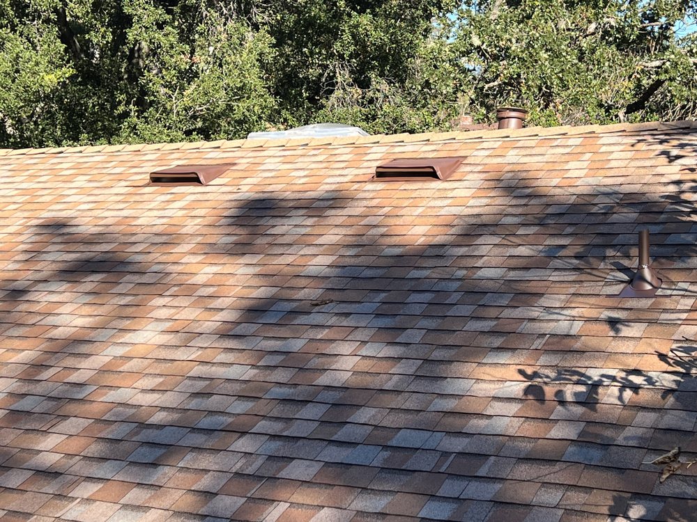 Slide of Everest Roofing