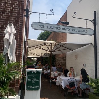 Sant Ambroeus Southampton - Alleyway seating has a separate seating hostess than inside the Restaurant. Very popular. - Italian Near Me - Southampton, New York Sant Ambroeus Southampton - Alleyway seating has a separate seating hostess than inside the Restaurant. Very popular. - Italian Near Me - Southampton, New York