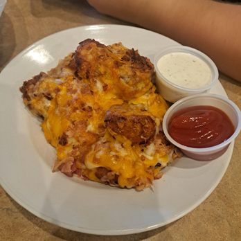 Montana Mike's Steakhouse - Cheesy Bacon House Tots - Steakhouses Near Me - Edinburgh, Indiana Montana Mike's Steakhouse - Cheesy Bacon House Tots - Steakhouses Near Me - Edinburgh, Indiana