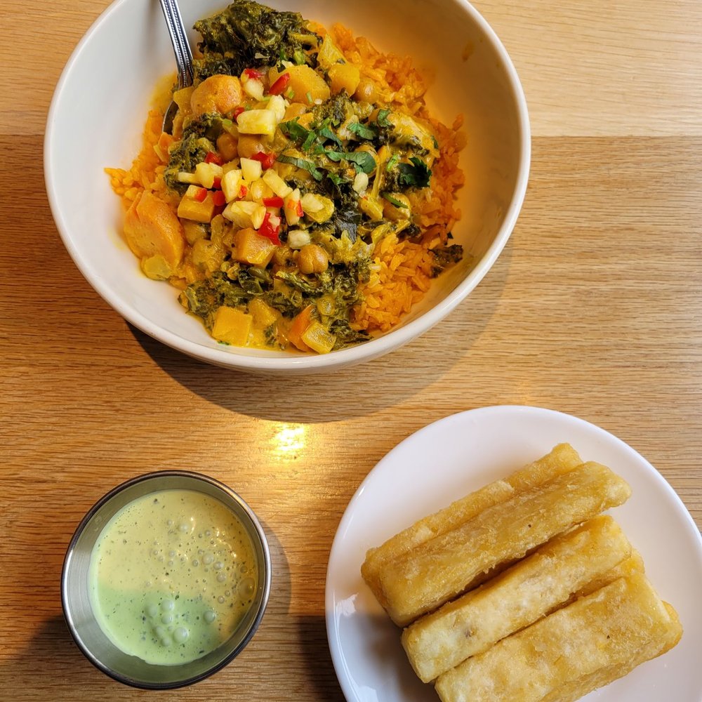 The curry bowl with a side of fried Yucca. The curry bowl with a side of fried Yucca.