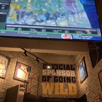 Buffalo Wild Wings - the scoreboard of the game - Chicken Wings Near Me - Silverdale, Washington
