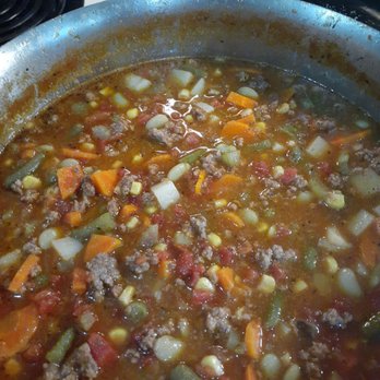 Cowgirl Chuckwagon - Homemade vegetable beef soup served with fried cornbread. - Food Trucks Near Me Cowgirl Chuckwagon - Homemade vegetable beef soup served with fried cornbread. - Food Trucks Near Me