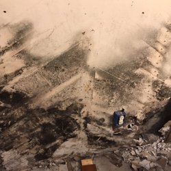 Aftermath Damage Services - Sheetrock behind panel walls