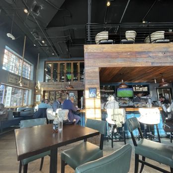 Kirwan's On The Wharf - Dining area and bar area with a second level overlooking the restaurant and a private room in the back. - Irish Pub Near Me - Washington, DC, District of Columbia Kirwan's On The Wharf - Dining area and bar area with a second level overlooking the restaurant and a private room in the back. - Irish Pub Near Me - Washington, DC, District of Columbia