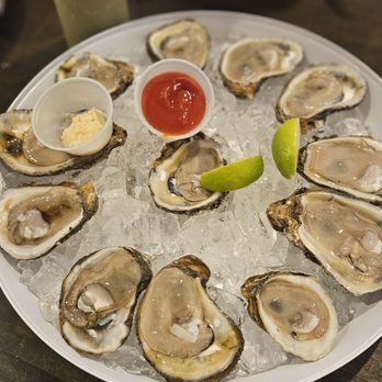 Deckhand Oyster Bar - Dozen oysters. They serve gulf but the best thing is the fish sauce mix you get to season them! - Seafood Near Me - Austin, Texas