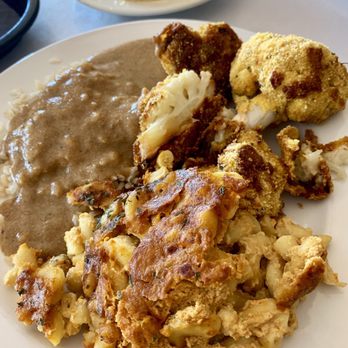 The New Soul Veg Restaurant & Cafe' - Mac and cheese, bbq cauliflower, and rice/gravy with corn bread. The mac and cheese and bbq cauliflower are the only ones I recommend!! - Vegetarian Near Me - Atlanta, Georgia
