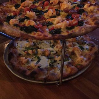 Sasso's Coal Fired Pizza - Top: shrimp, tomato, bacon Bottom: shrimp burrata and basil - Pizza Near Me - Torrington, Connecticut Sasso's Coal Fired Pizza - Top: shrimp, tomato, bacon Bottom: shrimp burrata and basil - Pizza Near Me - Torrington, Connecticut