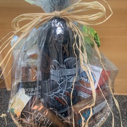 Bottle of local red wine, popcorn, nuts, chocolates, fudge galore!!!