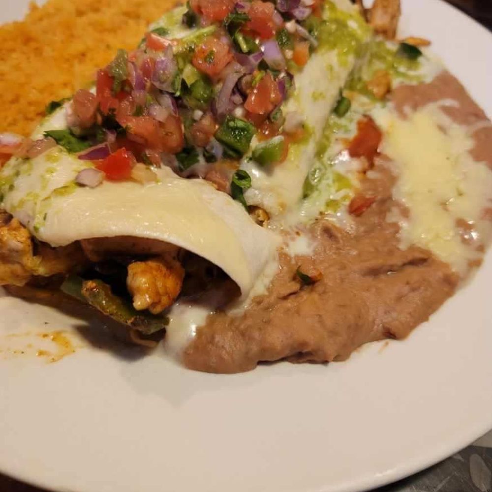A large burrito with everything. Very flavorful