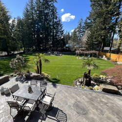 Cedar County Landscaping - Stamped concrete patio with new lawn
