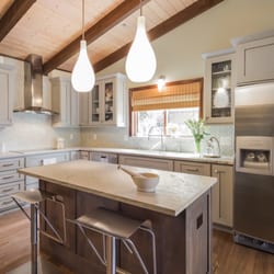 Laura Medicus Interiors - Leathered granite countertops soften the look of the kitchen.  Check out my blog post on this home for more!  http://wp.me/p1gC8D-kv