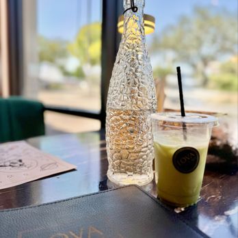 Lova Cafe - Iced matcha & water bottle - Breakfast & Brunch Near Me - San Antonio, Texas