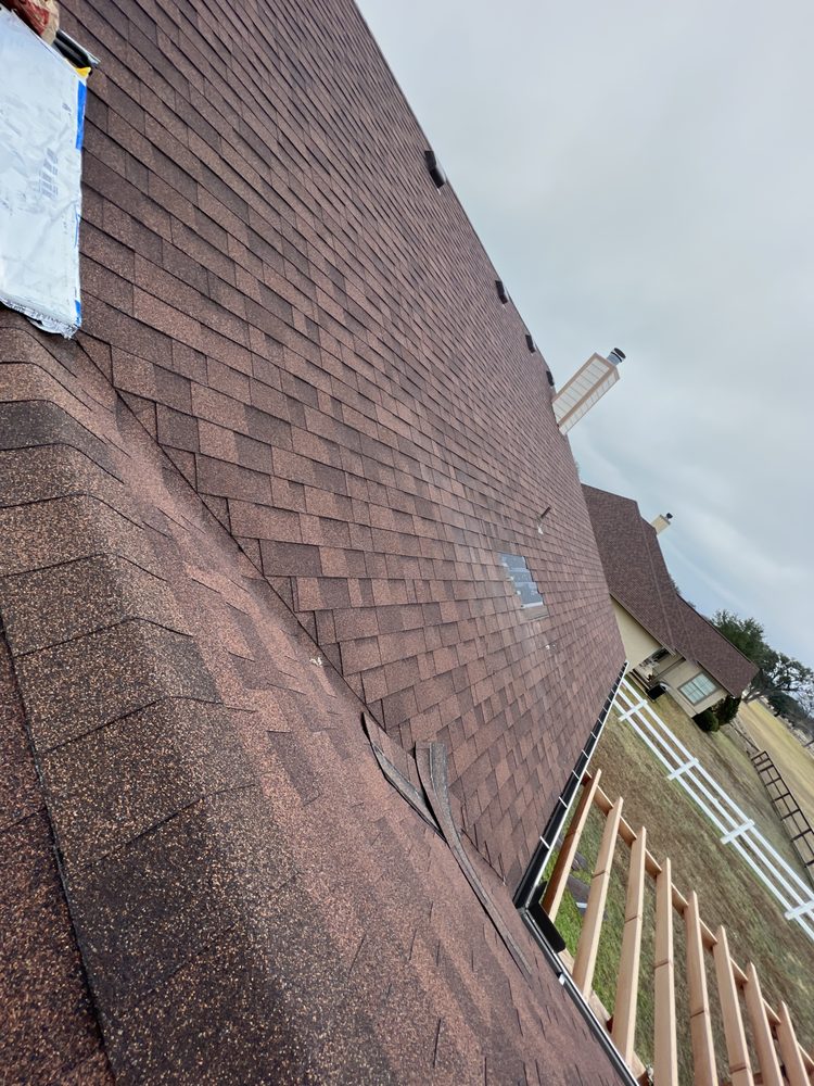 Slide of Pioneer Roof Pros