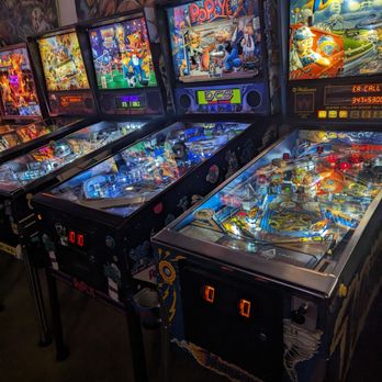Super Abari Game Bar - a row of pinball machines - Arcades Near Me - Charlotte, North Carolina Super Abari Game Bar - a row of pinball machines - Arcades Near Me - Charlotte, North Carolina